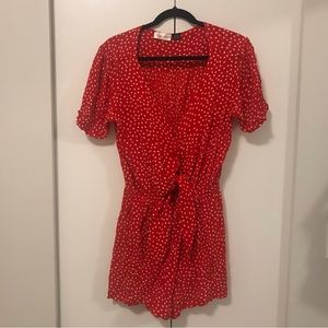 Red polka dotted romper